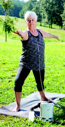 Caire Freestyle Elderly Woman Exercising With Machine